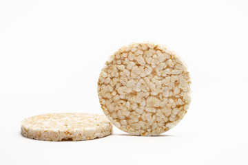 two Puffed rice cakes isolated on white