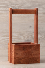 Basket with wooden handle