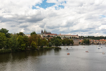 Panoramic view of Prague Castle, St. Vitus Cathedral and Charles Bridge in Prague