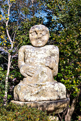 Fototapeta premium A stone image of the Buddha at Rakan-ji temple in Kasai city, Hyogo prefecture, Japan