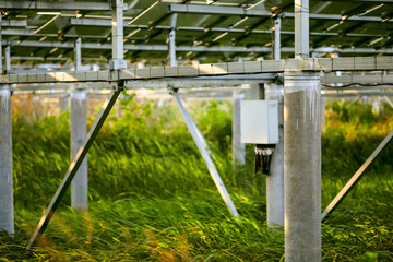 Detail view of the back of a solar photovoltaic panel built with an iron bracket