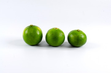 Fototapeta na wymiar fresh green lime on white background