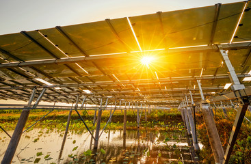 Detail view of the back of a solar photovoltaic panel built with an iron bracket