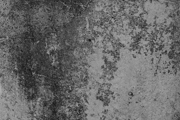 Texture of a concrete wall with cracks and scratches which can be used as a background