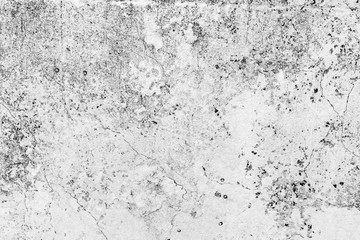 Texture of a concrete wall with cracks and scratches which can be used as a background