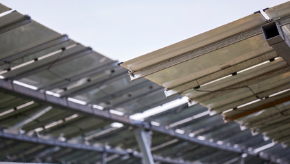 Detail view of the back of a solar photovoltaic panel built with an iron bracket