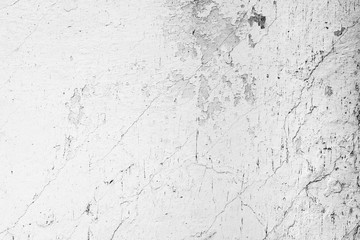 Texture of a concrete wall with cracks and scratches which can be used as a background