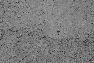 Texture of a concrete wall with cracks and scratches which can be used as a background