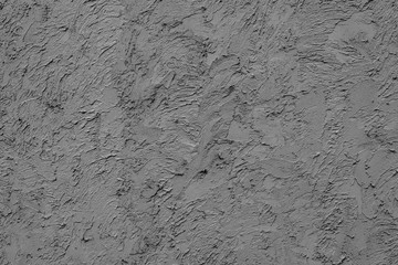 Texture of a concrete wall with cracks and scratches which can be used as a background
