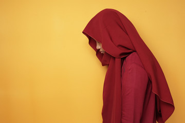 Sad Asian Teenage Muslim Girl Looking Down