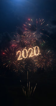 2020 vertical greeting text with particles and sparks on black night sky with colored fireworks on background, beautiful typography magic design, portrait orientation.