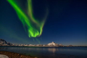 aurora borealis, polar lights, over mountains in the North of Europe, Norway