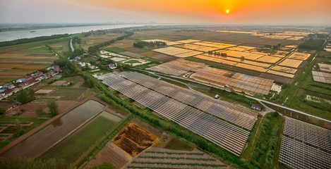 Aerial sunset solar photovoltaic outdoors