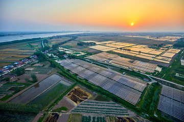 Aerial sunset solar photovoltaic outdoors