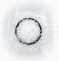 Polypropylene granule close-up background texture.