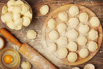 The process of cooking traditional Russian dish - pelmeni	