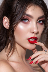 Fashion close up portrait of a very beautiful brunette model with professional rose smokey eyes,...