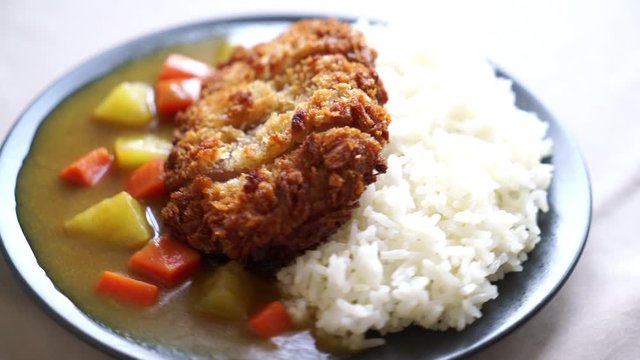 Crispy fried pork cutlet with curry and rice