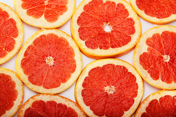 Background formed with sliced grapefruits	
