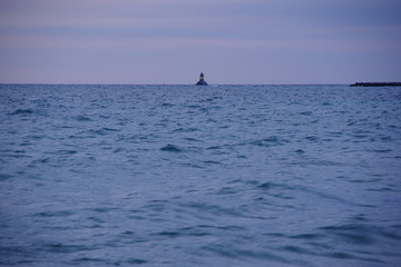 Obraz premium Lighthouse at sea