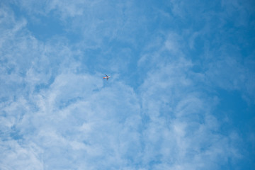 Plane in the blue sky