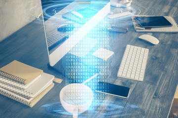 Technology theme drawing and table with computer. Double exposure. Concept of information.