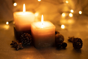 christmas candles on golden background