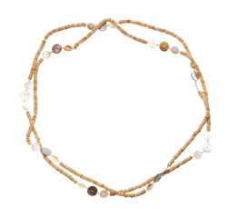 Naklejka premium necklace from natural bone beads isolated on white