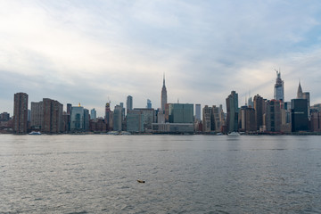 Fototapeta na wymiar Midtown Manhattan Skyline along the East River in New York City