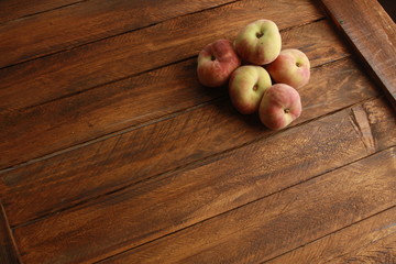 Paraguayan peach on wooden background
