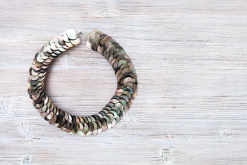 top view of nacre discs necklace on gray
