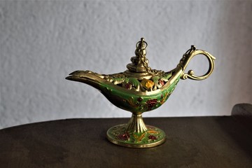 Fototapeta na wymiar miniature of magic lamp as per popular Arabian fairy tales about Aladdin
