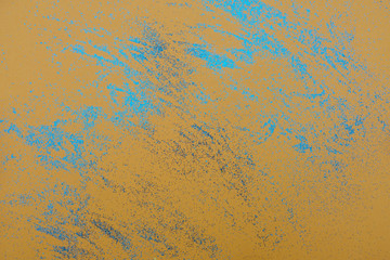 Abstract background. Blue sequins on an orange background. Template for your design. Blue - color of the year 2020.