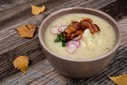 Potato Soup Topped with Bacon, Radish Greens and Radishes