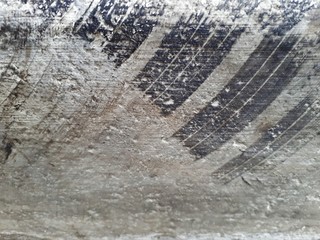  close-up of a decorative wall made of concrete, with a characteristic rough porous texture,...