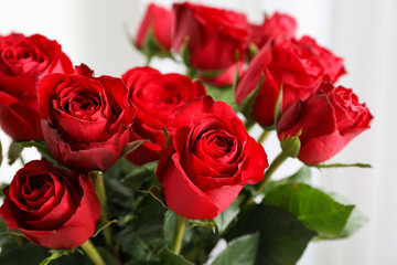 Bouquet of red roses, close up. Blurred background at the back