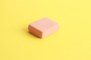 pink eraser on colorful background