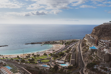 Beautiful stunning panoramic view of Puerto Rico. Playa de Amadores beach on Gran Canaria island in Spain near Tenerife island.