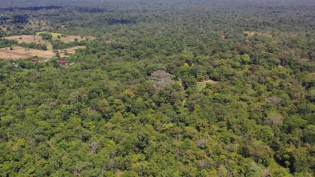 Ancient khmer pyramid in Koh Ker, Cambodia with blue sky and clouds, sunny day