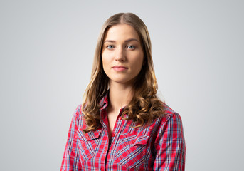 Young woman having serious and calm face