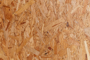 Wood board made from piece of wood, close up pressed wooden panel background