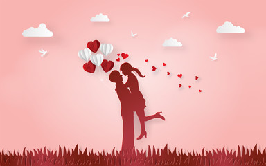 Origami Paper art of Silhouette cute couple show the love to each other with balloon in girl's hand on grass floor, Love and Happy Valentine's Day