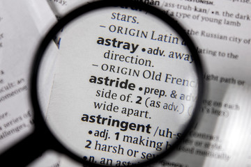 The word or phrase astride in a dictionary.