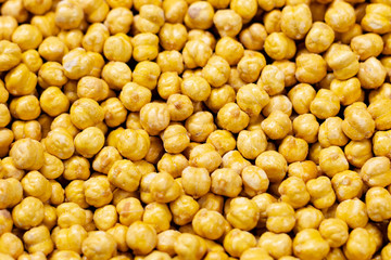Chickpeas dry organic yellow in bulk. Top View.