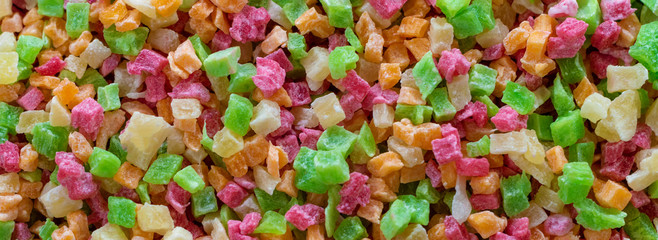 Lot of slices of multicolors cube marmalade. Top view.