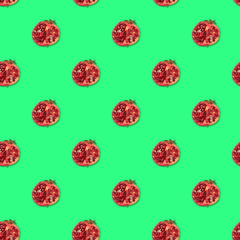 Pomegranate half seamless pattern on green background