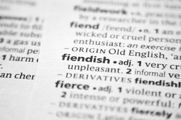 Word or phrase Fiendish in a dictionary.