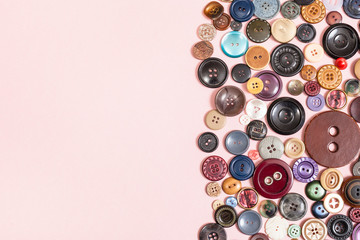 various buttons on pink background with copyspace