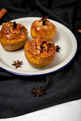 Homemade roasted apples on white background