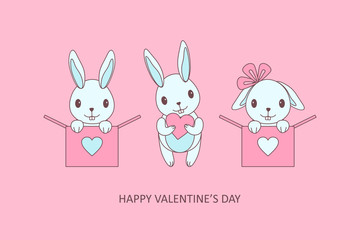 Obraz na płótnie Canvas Happy Valentine's Day! cute little bunnies babies give Valentine cards